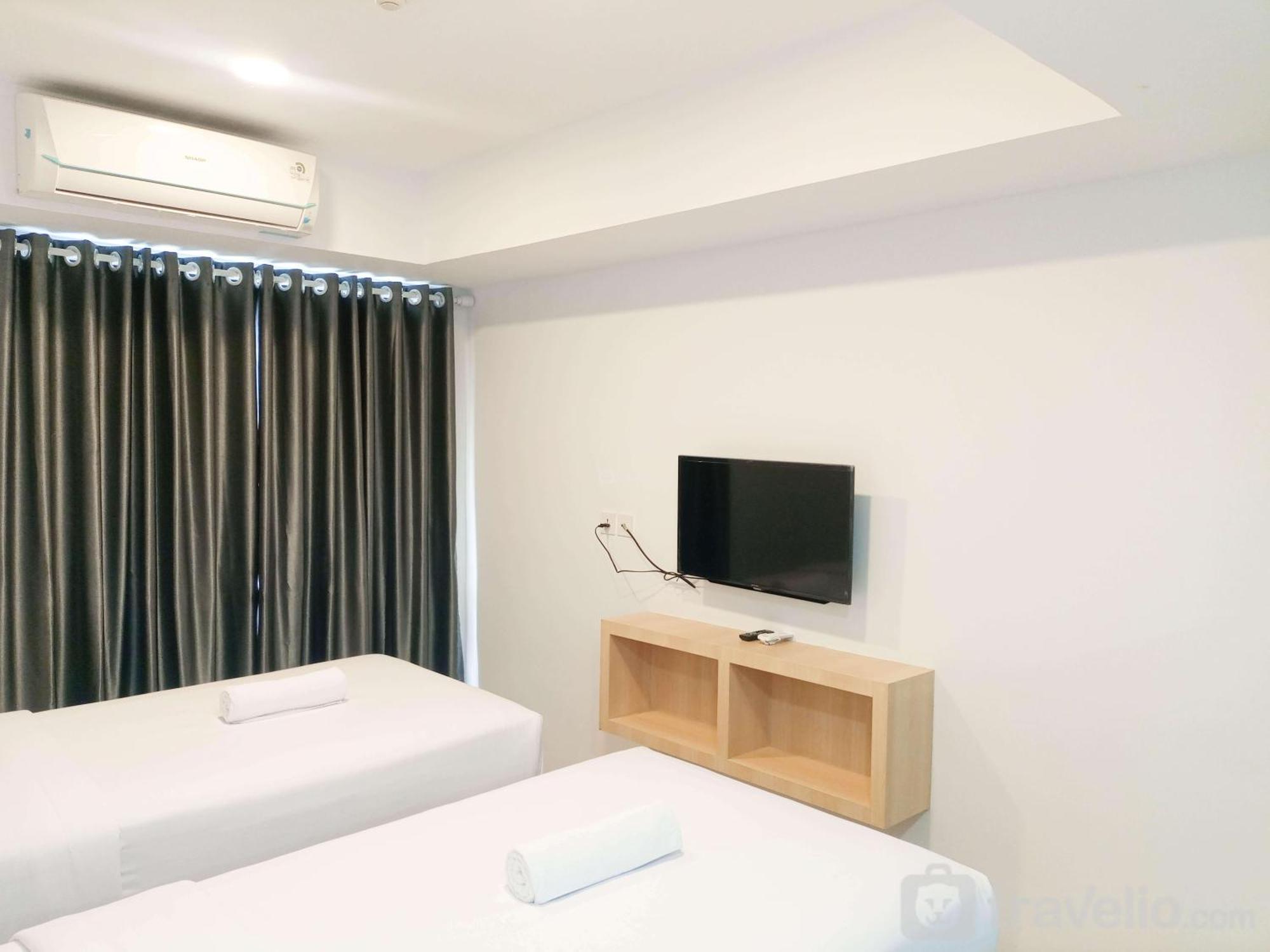 Comfy And At 27th Floor De Prima By Travelio