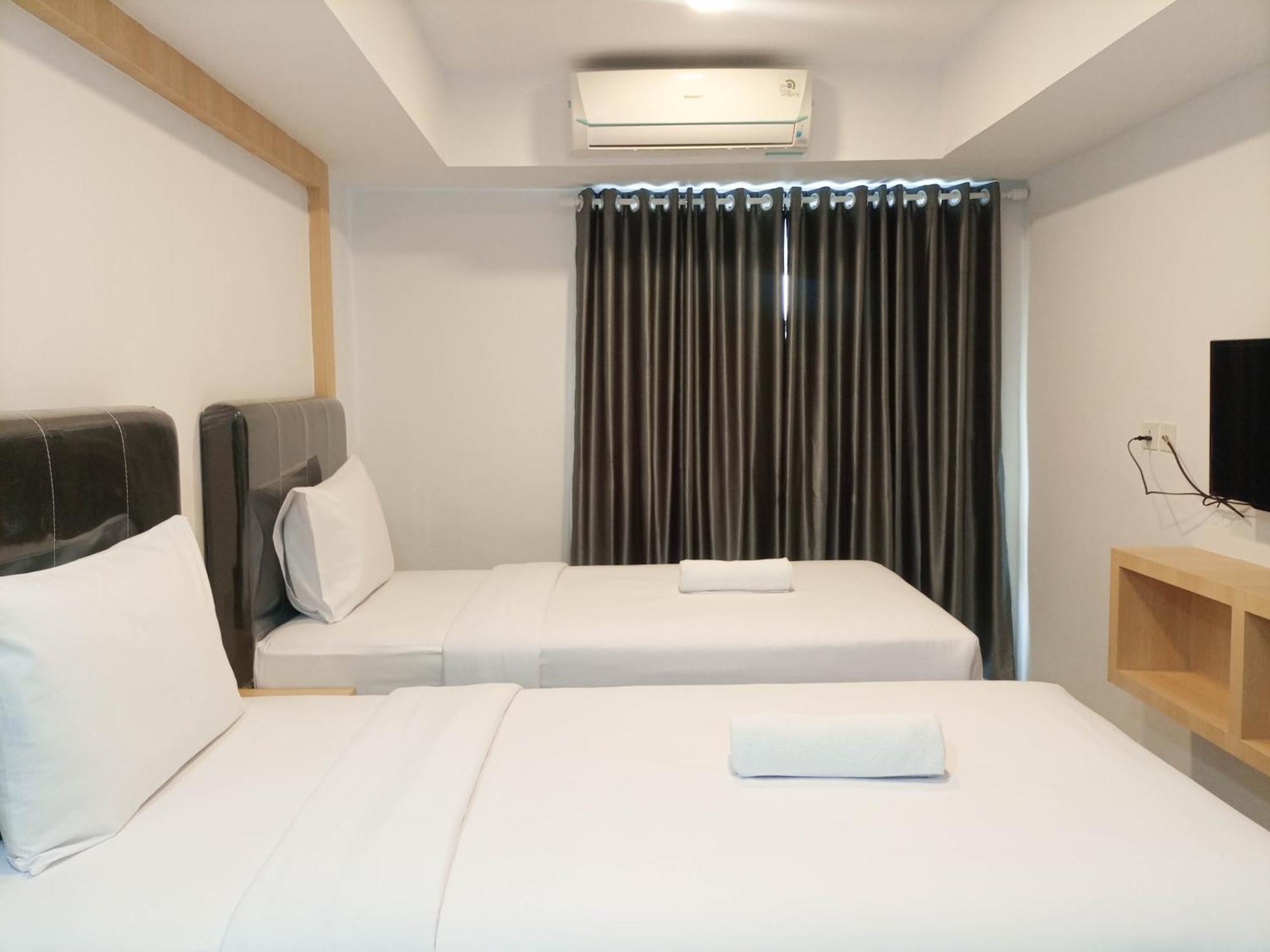 Comfy And At 27th Floor De Prima By Travelio