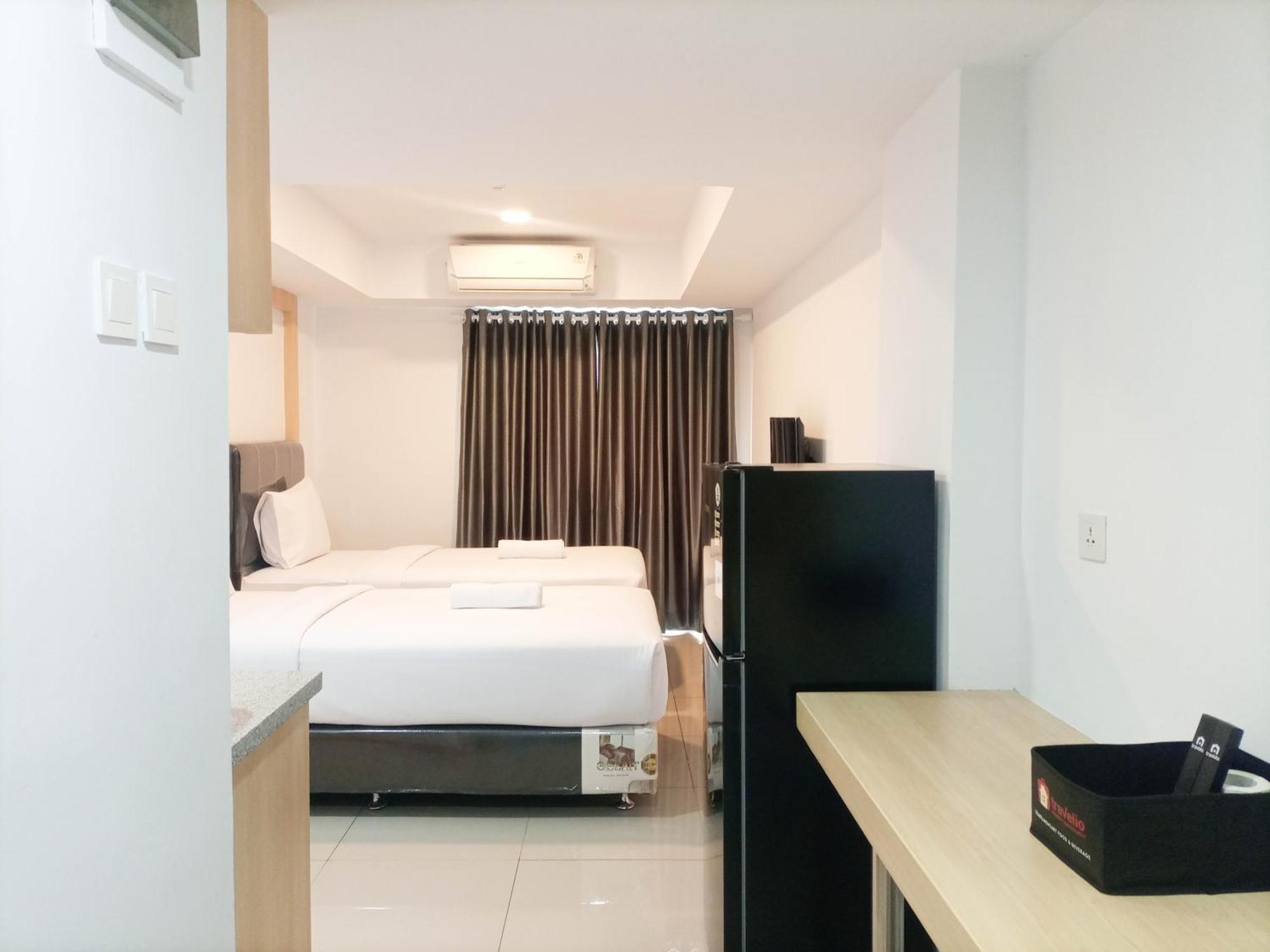 Comfy And At 27th Floor De Prima By Travelio *